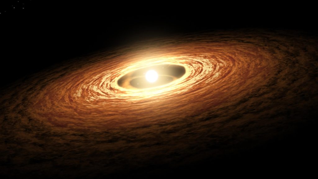 Disco protoplanetario con al centro la protostella che originerà il nostro Sole (fonte: sushi168.com)